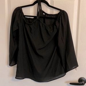 Black off shoulders top with lining under sheer top. EUC no defects